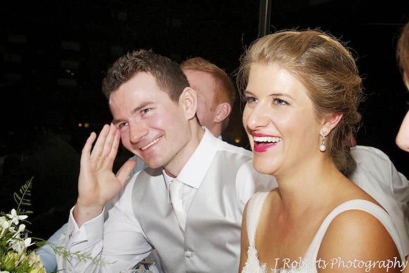 Couple laughing at wedding speeches - wedding photography sydney